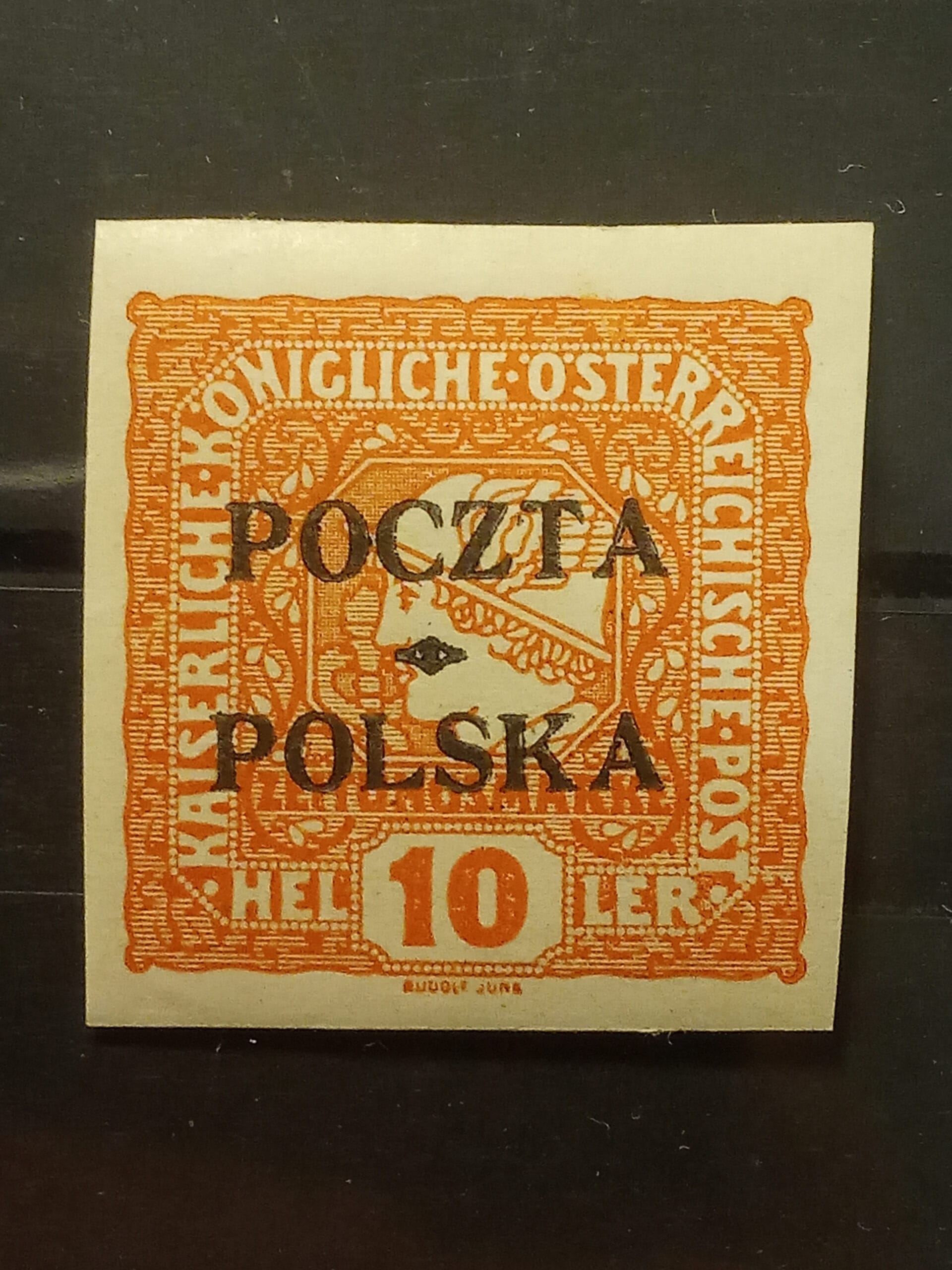 Niekasowany znaczek pocztowy z pełną, nienaruszoną warstwą oryginalnego kleju na rewersie