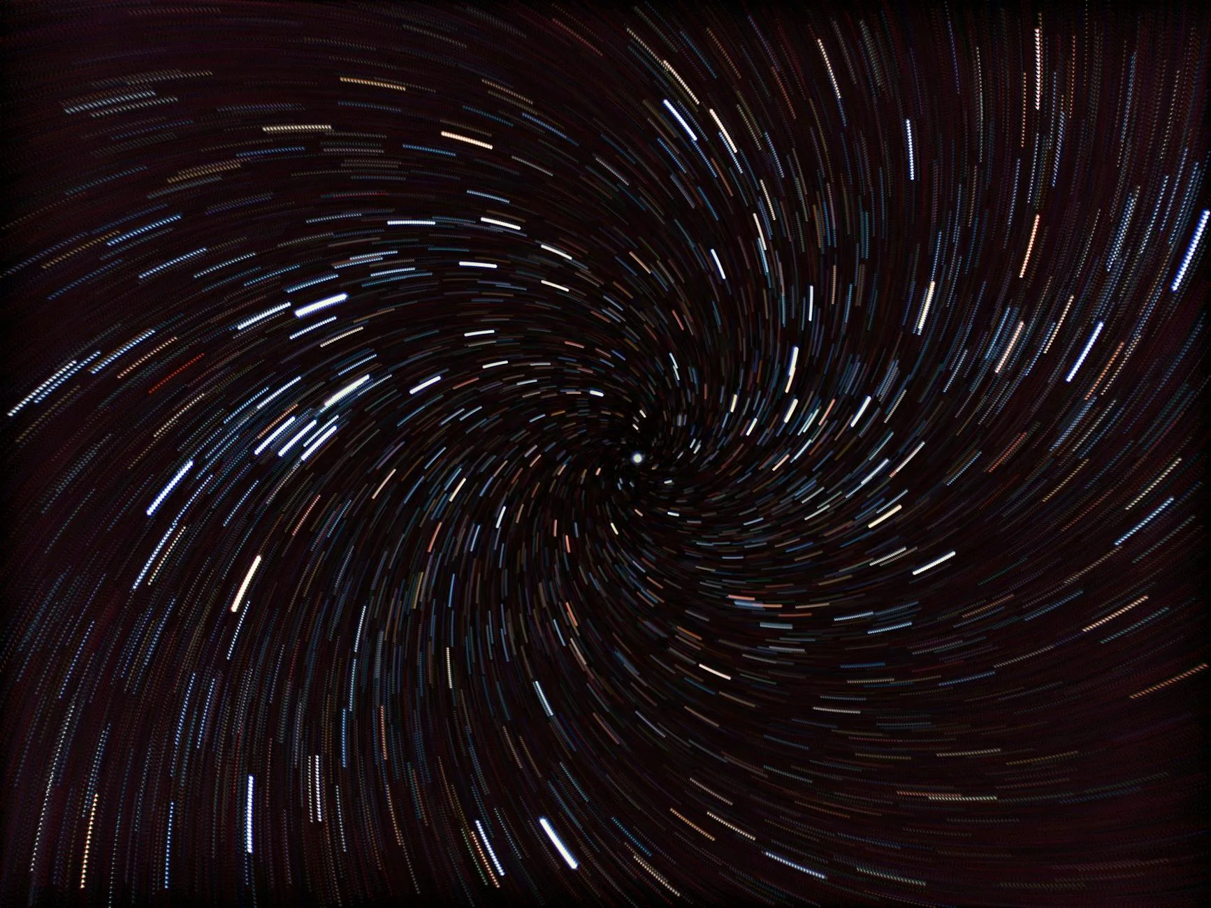 Czy wszechświat jest „blokiem czasu”? O koncepcji block universe bez filozofowania Spiralne smugi gwiazd na nocnym niebie ukazujące ruch i upływ czasu